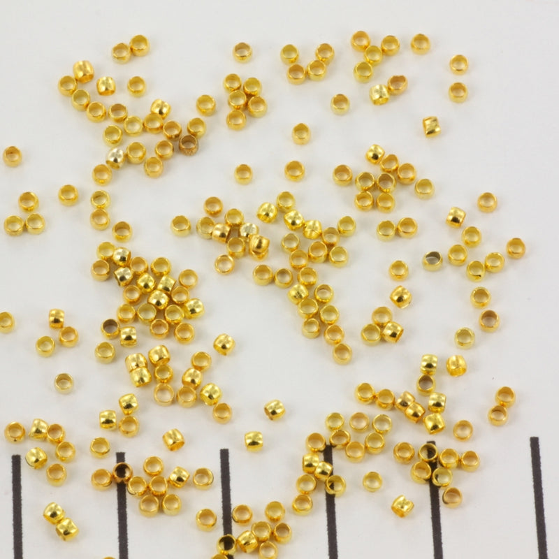 Gouden knijpkraal (2mm)